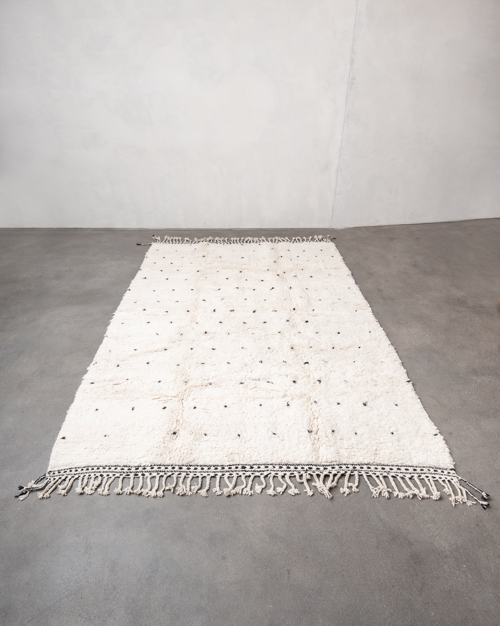 Modern, designer, handcrafted Berber rug from Morocco. Beniourain carpet with beautiful colours and patterns and fluffy wool texture.